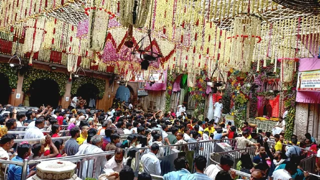 A devotee faints due to heat and pressure at Banke Bihari Temple Vrindavan in Mathura