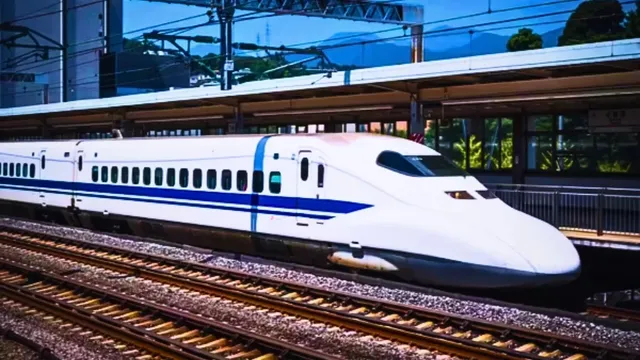 A conceptual model of the Mumbai Ahmedabad Bullet Train Phase 1 on tracks in India.