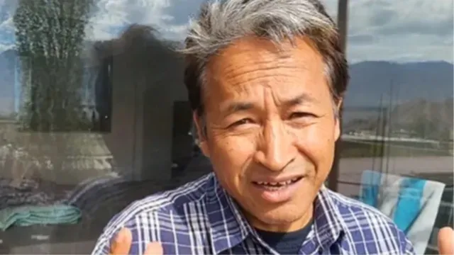A close-up view of a street wall in Guwahati where the controversial Sonam Wangchuk Wall Painting was being created by two youths.