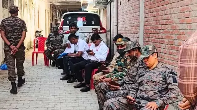 Officials inspecting the premises during the Varanasi pigeon breeder house raid ahead of the air show.