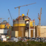 Technicians installing Russian non-programmable modules for Nuclear Plant Safety Tech at Kudankulam atomic station.